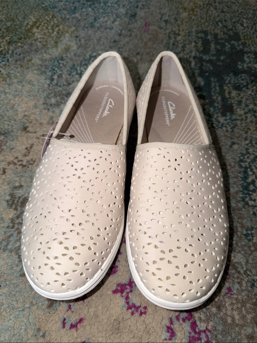 Clarks Women’s Perforated Slip-On Flats in Light Beige